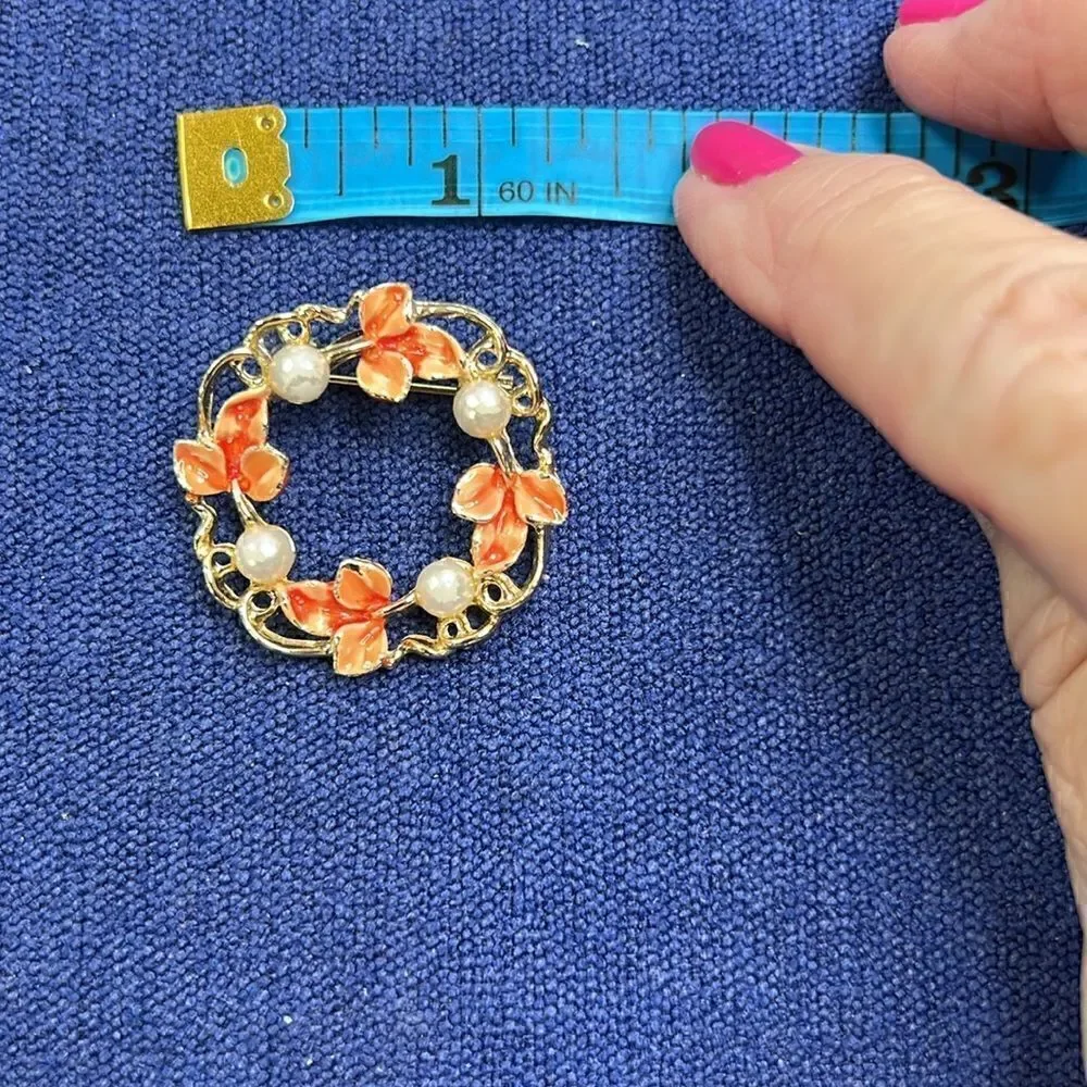 Gerry’s Gold Tone and Orange Wreath